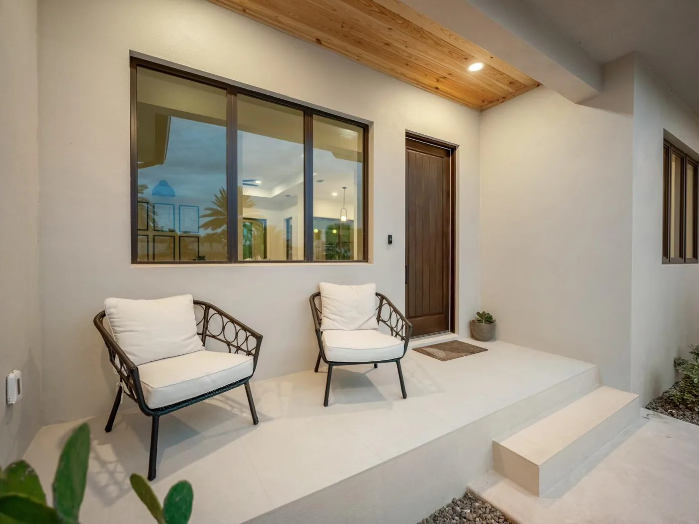 Large-format tile on the front porch and steps