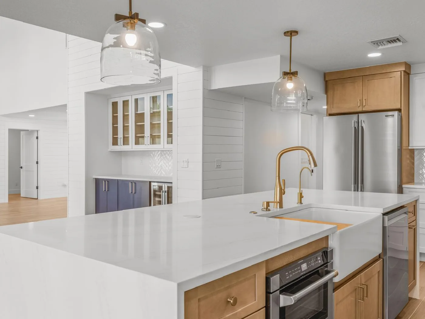 Herringbone backsplash at the kitchen bar